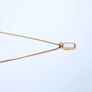 Elegant Gold Necklace with White Milky Stone Pendant