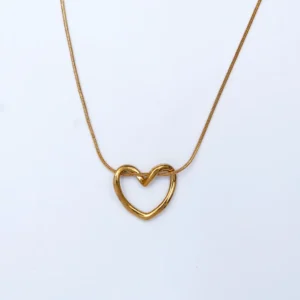 gold heart pendant necklace Pakistan close up premium jewelry Zevel
